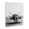 Stupell Industries Highland Cow on Couch Canvas By Petal Prints Design